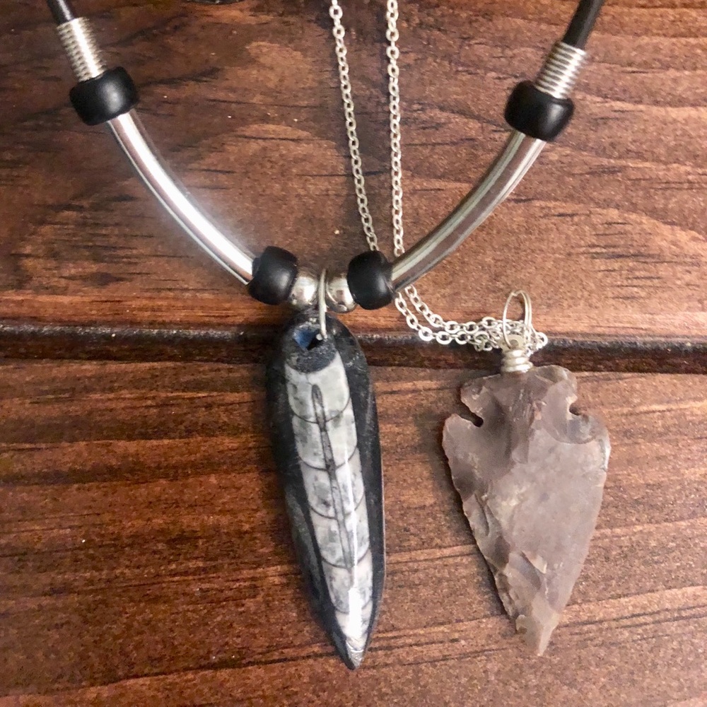 **A SET OF TWO FOSSIL NECKLACES**